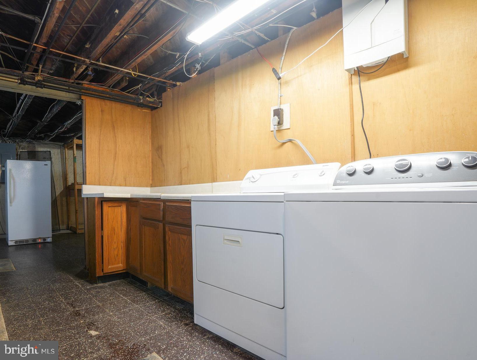 616 Warwick Road Baltimore, MD 21229 - Photo 26 of 32 Laundry area & large unfinished area behind it