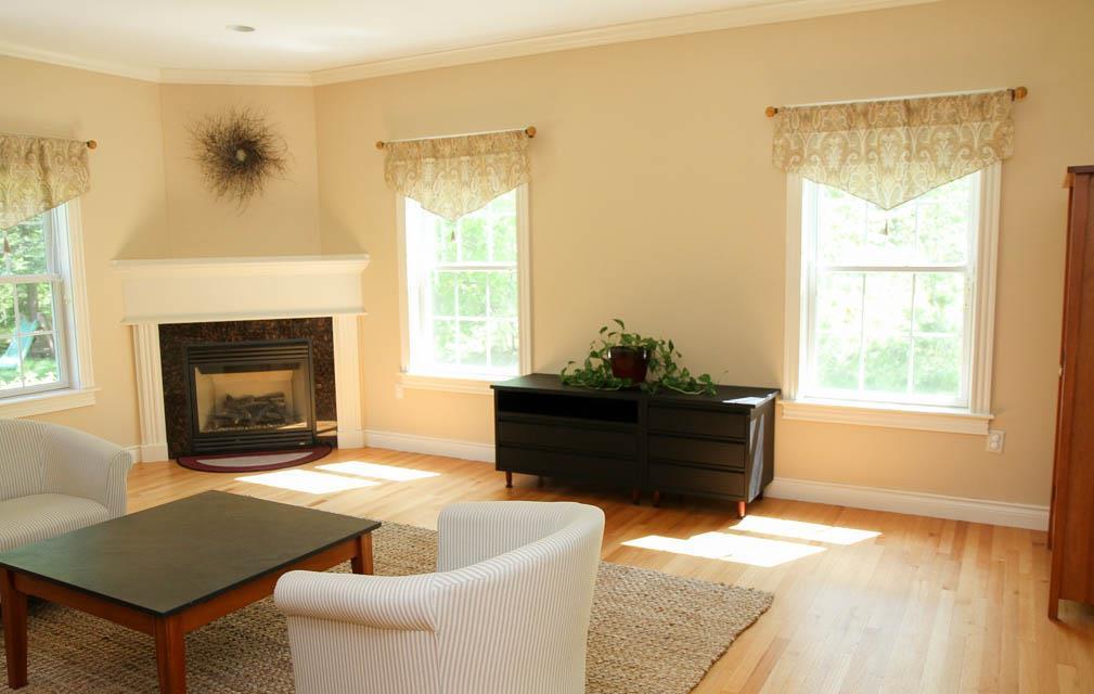 366 Montsweag Road Woolwich, ME 04579 - Photo 9 of 32 Formal living room with gas fireplace