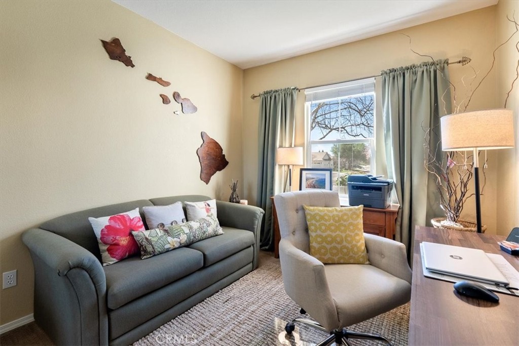 1945 Fieldstone Circle Paso Robles, CA 93446 - Photo 28 of 48 a living room with furniture and a window