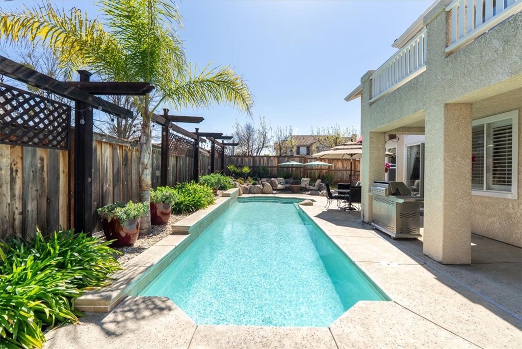 1945 Fieldstone Circle Paso Robles, CA 93446 - Photo 37 of 48 a view of a backyard with potted plants