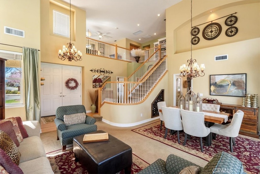 1945 Fieldstone Circle Paso Robles, CA 93446 - Photo 4 of 48 a living room with furniture and a chandelier