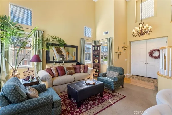 a view of a living room and dining room
