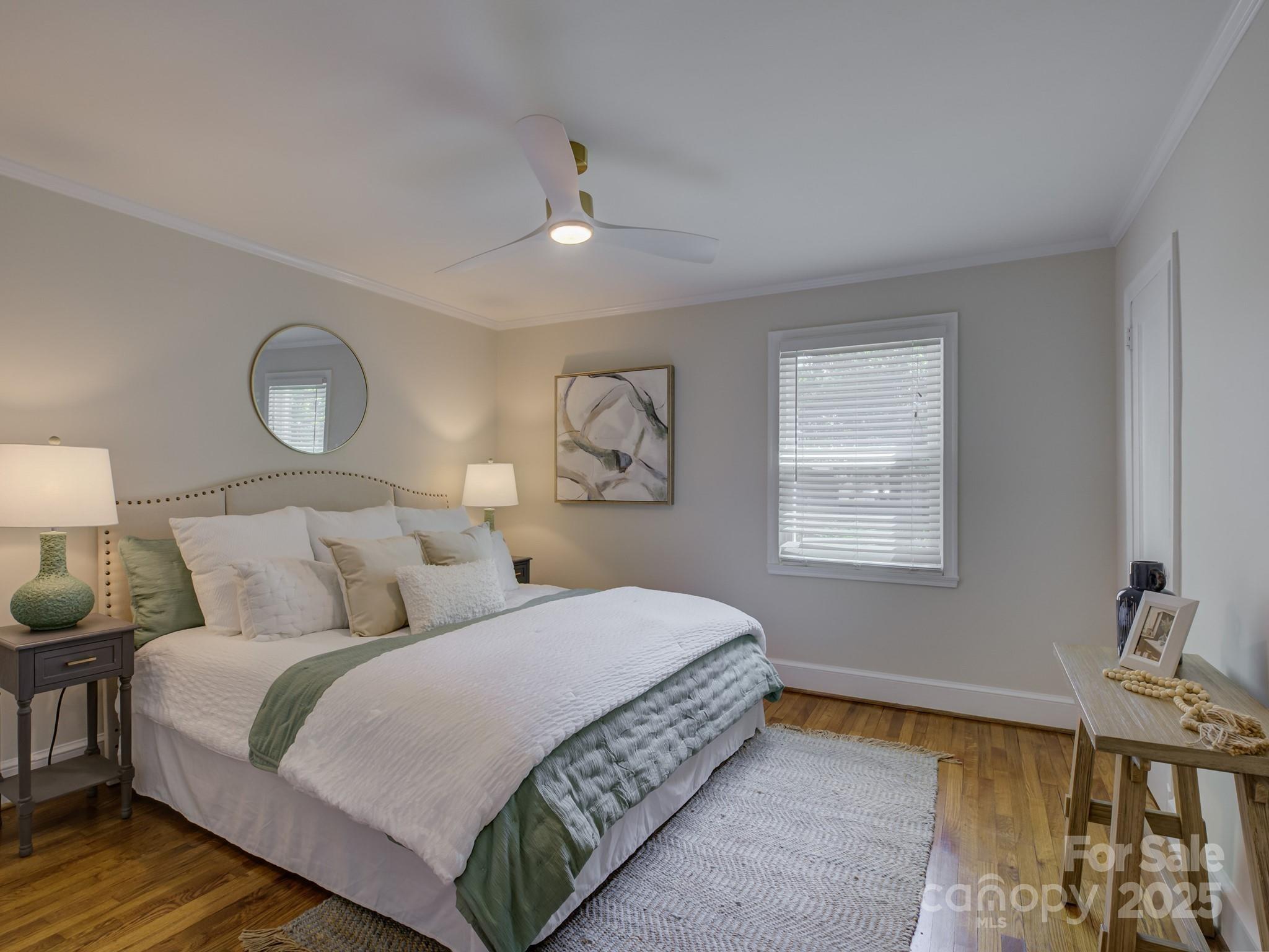 1069 Sedgefield Road Charlotte, NC 28209 - Photo 22 of 45 a bedroom with a bed and a window