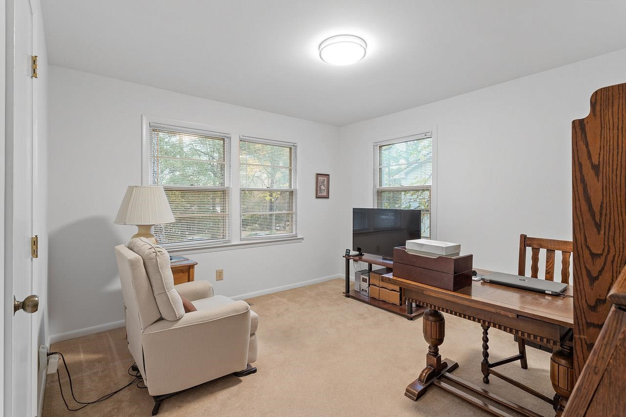 809 Silver Leaf Place Raleigh, NC 27609 - Photo 23 of 34 a living room with furniture and a window