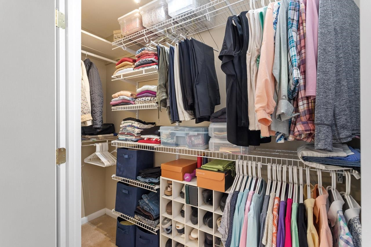 809 Silver Leaf Place Raleigh, NC 27609 - Photo 25 of 34 a view of walk in closet with clothes and shoes
