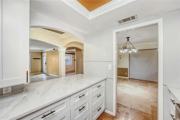 a view of cabinet and mirror