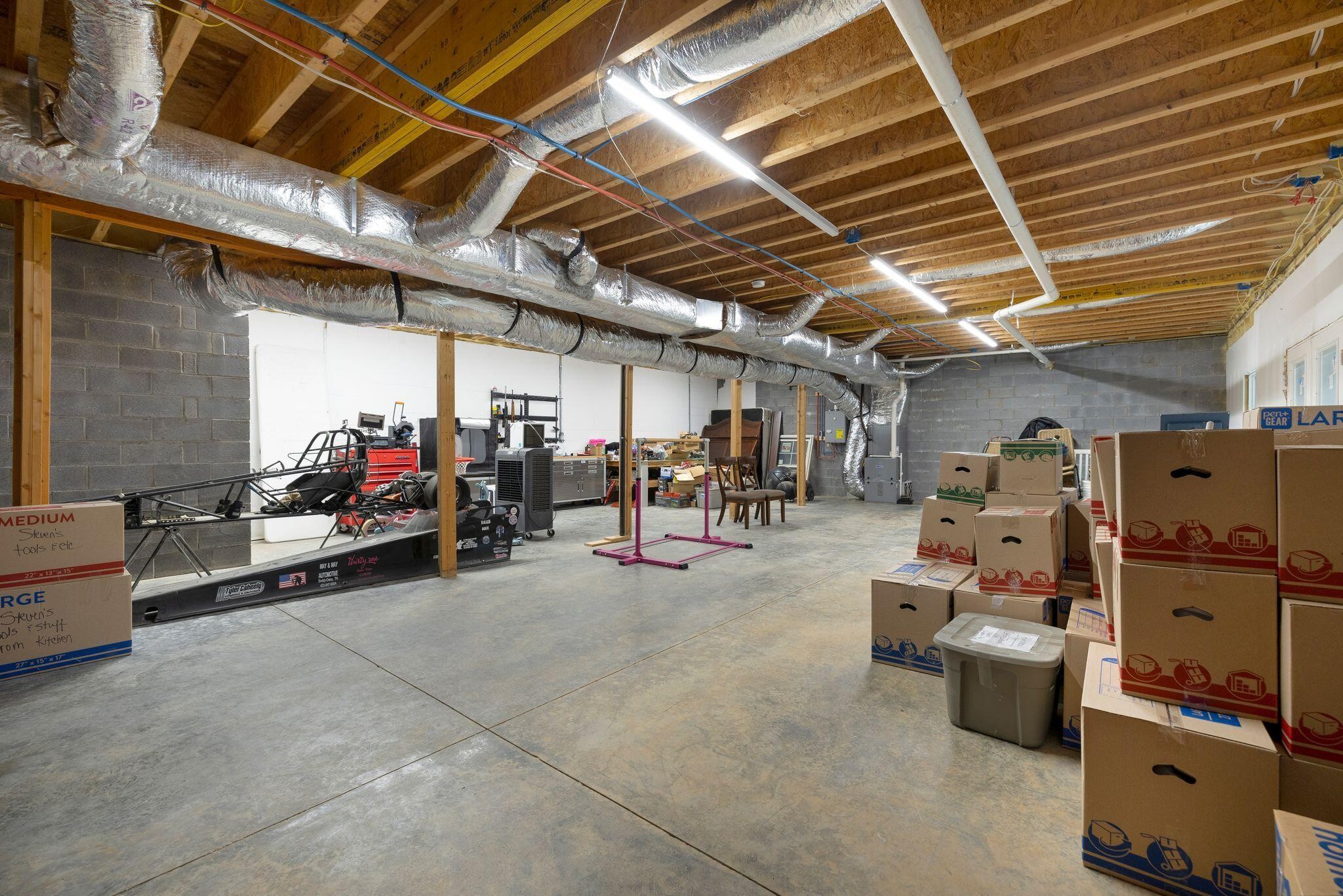 6866 Daus Mountain Road Whitwell, TN 37397 - Photo 32 of 49 a view of a garage with storage
