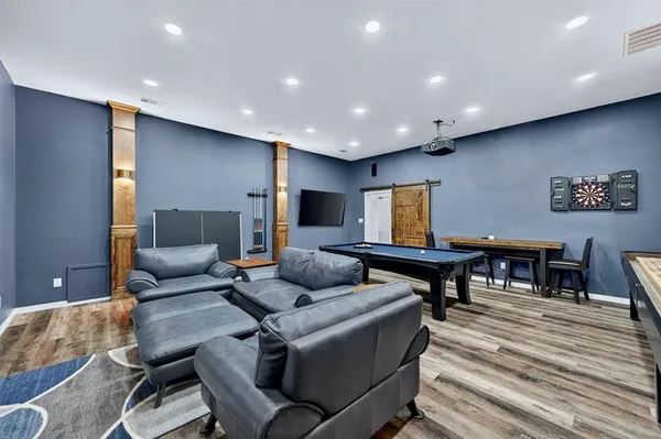 a living room with furniture and a table