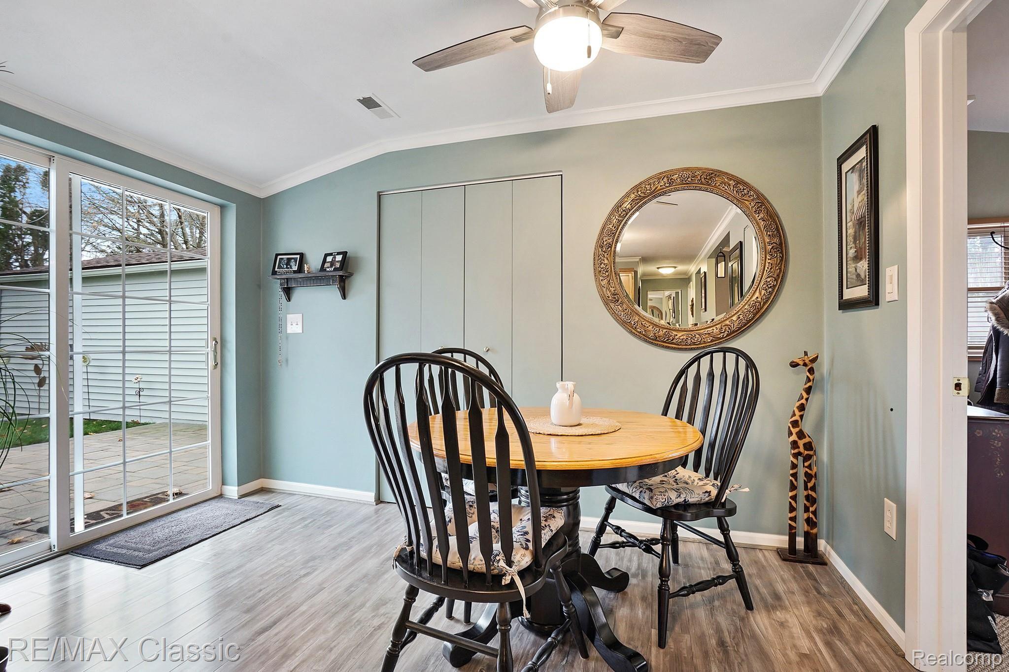 1396 Decker Road Walled Lake, MI 48390 - Photo 16 of 19 Ceiling Fan in Breakfast Nook