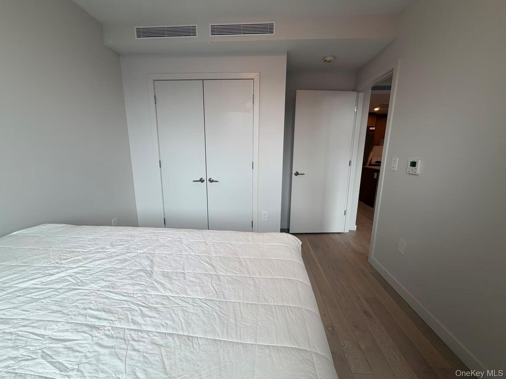 131-02 40th Road, Unit 7O Queens, NY 11354 - Photo 7 of 7 a view of empty room