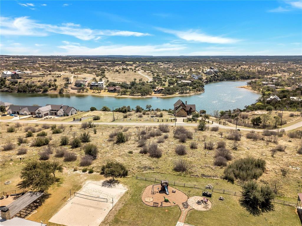 7036 Hells Gate Loop Strawn, TX 76475 - Photo 4 of 23 an aerial view of a city