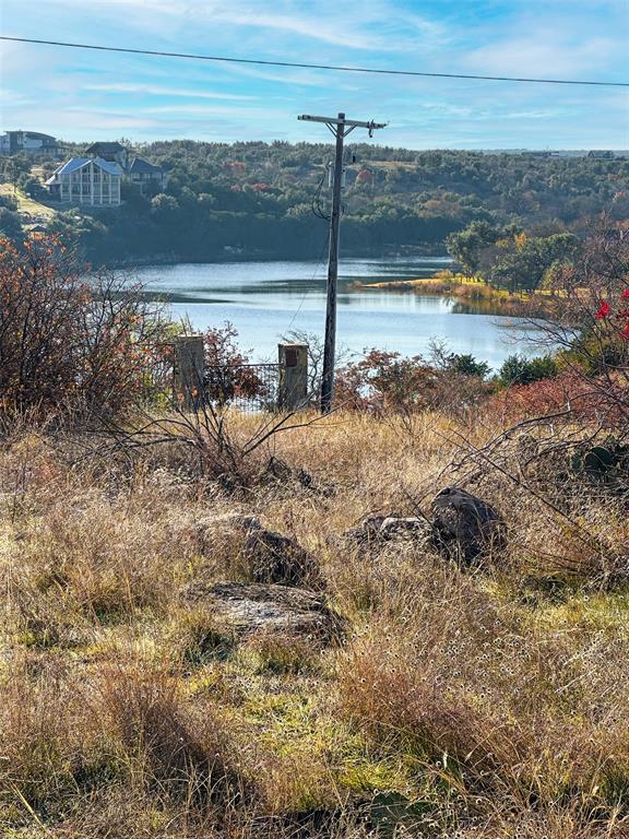 7036 Hells Gate Loop Strawn, TX 76475 - Photo 9 of 23 a view of a water view of a yard