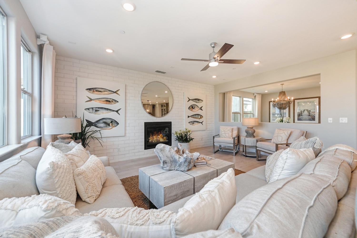 2009 Arbor Rdg Drive Roseville, CA 95747 - Photo 22 of 70 a living room with furniture a fireplace and a window