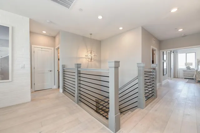 a spacious bathroom with a granite countertop sink a mirror and a