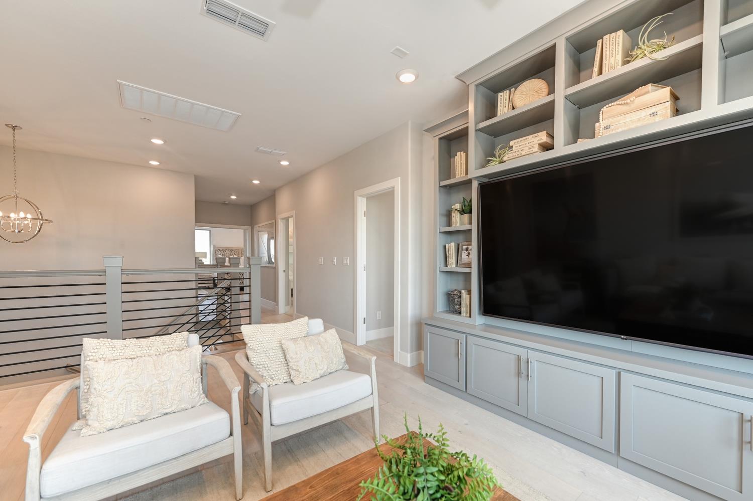 2009 Arbor Rdg Drive Roseville, CA 95747 - Photo 25 of 70 a living room with furniture windows and flat screen tv