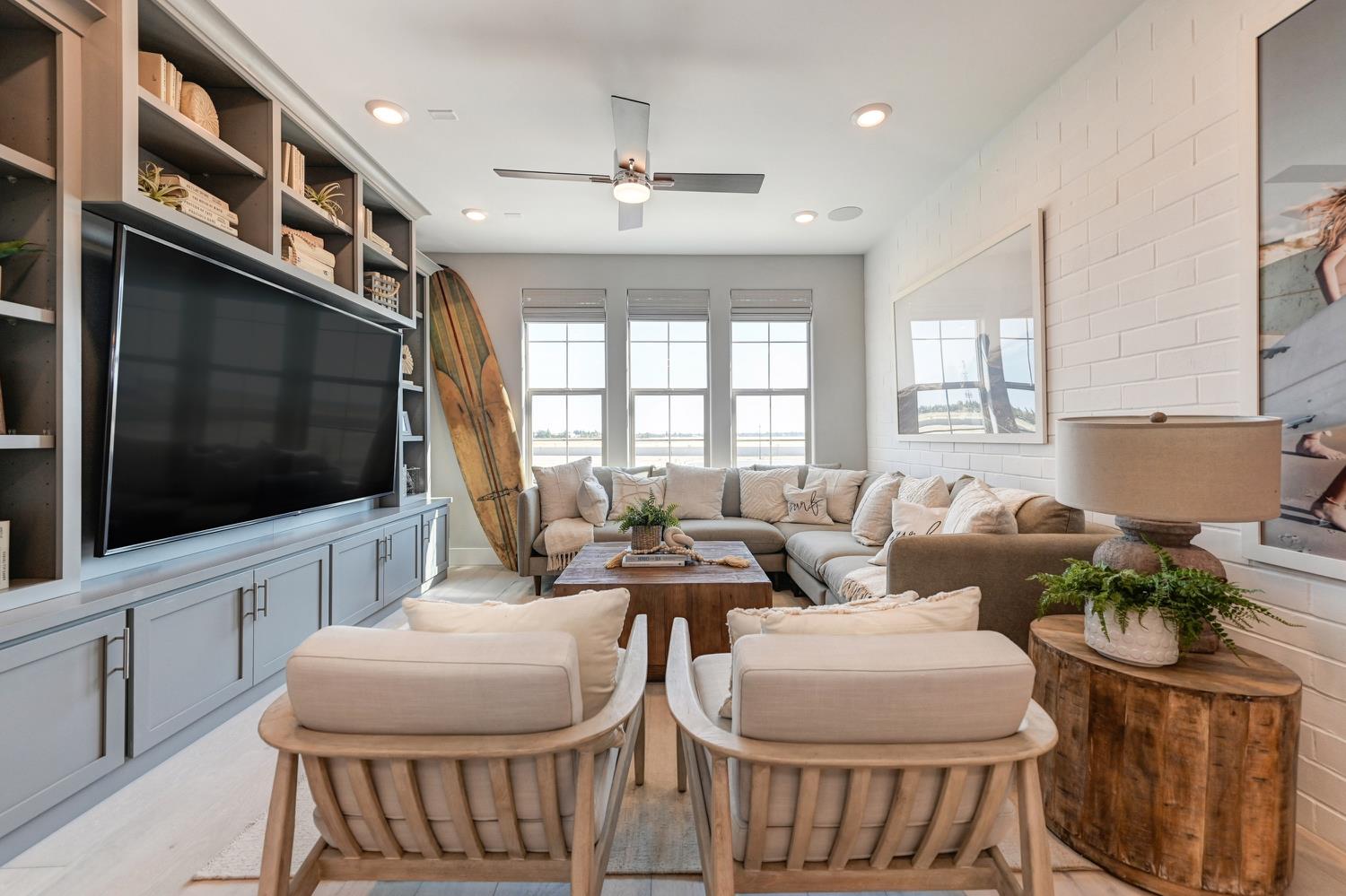 2009 Arbor Rdg Drive Roseville, CA 95747 - Photo 26 of 70 a living room with furniture a flat screen tv and a window