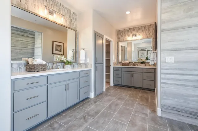 a bathroom with a toilet and a shower curtain
