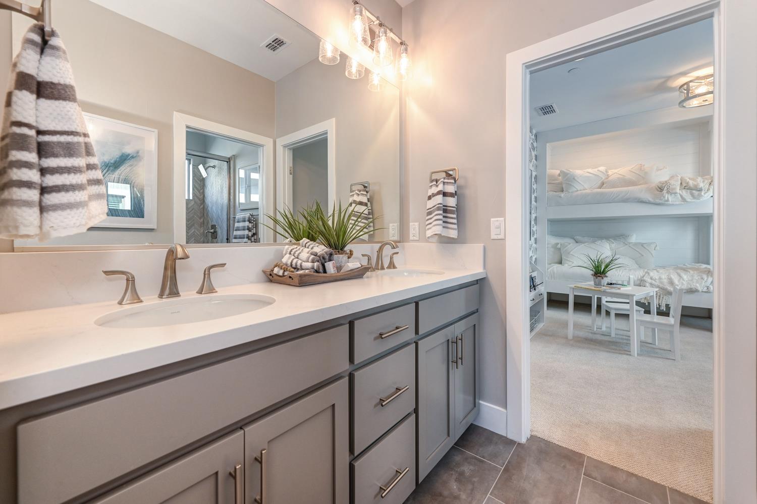 2009 Arbor Rdg Drive Roseville, CA 95747 - Photo 39 of 70 a spacious en suite bathroom with double sink and a mirror