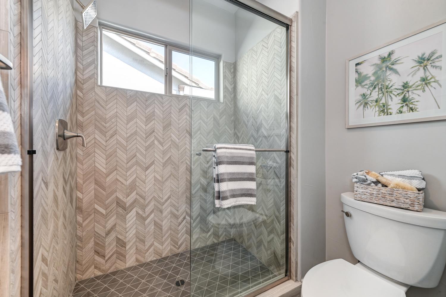 2009 Arbor Rdg Drive Roseville, CA 95747 - Photo 40 of 70 a bathroom with a toilet and a shower curtain