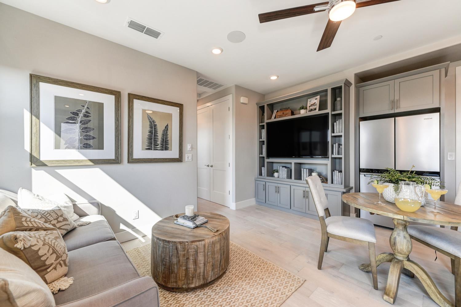 2009 Arbor Rdg Drive Roseville, CA 95747 - Photo 49 of 70 a living room with furniture and a flat screen tv