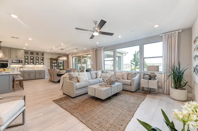 a view of an entryway and wooden floor