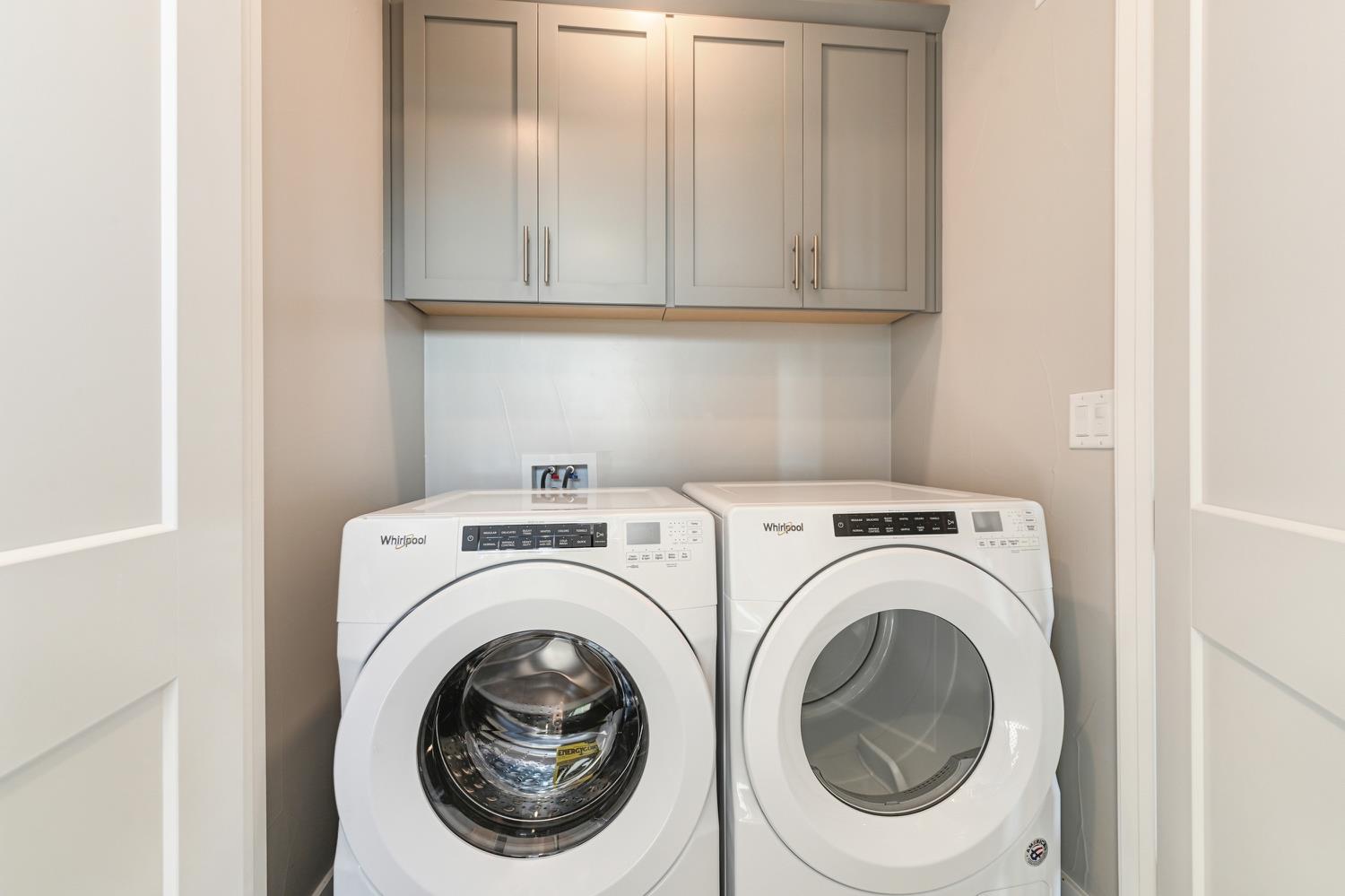 2009 Arbor Rdg Drive Roseville, CA 95747 - Photo 52 of 70 a utility room with dryer and washer