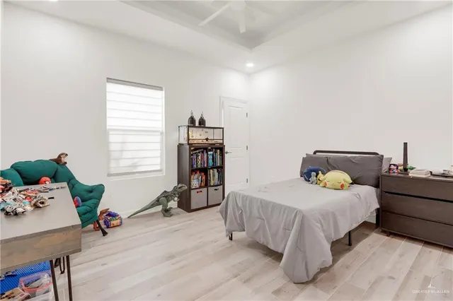 a bathroom with double sink and a mirror