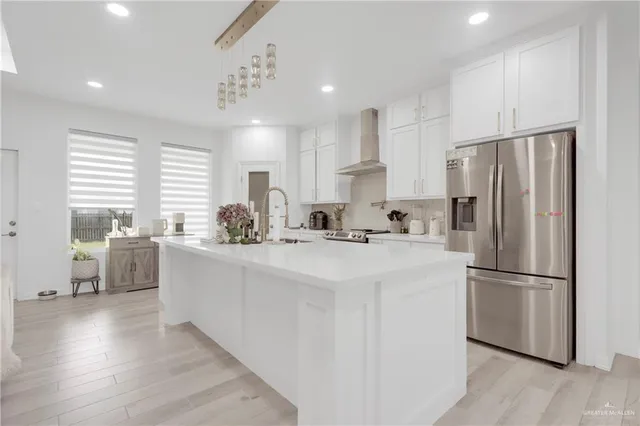 a view of living room with furniture and flat screen tv