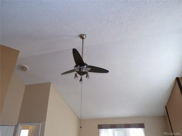 a view of a room with a window