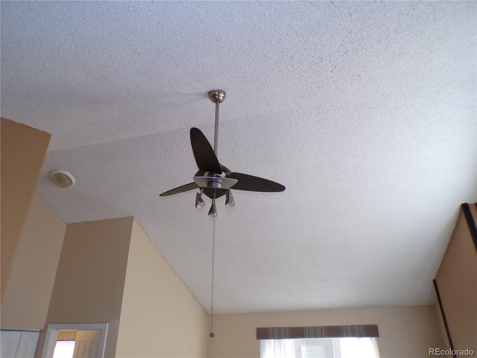 9644 West Chatfield Avenue, Unit A Littleton, CO 80128 - Photo 9 of 11 a view of a room with a window