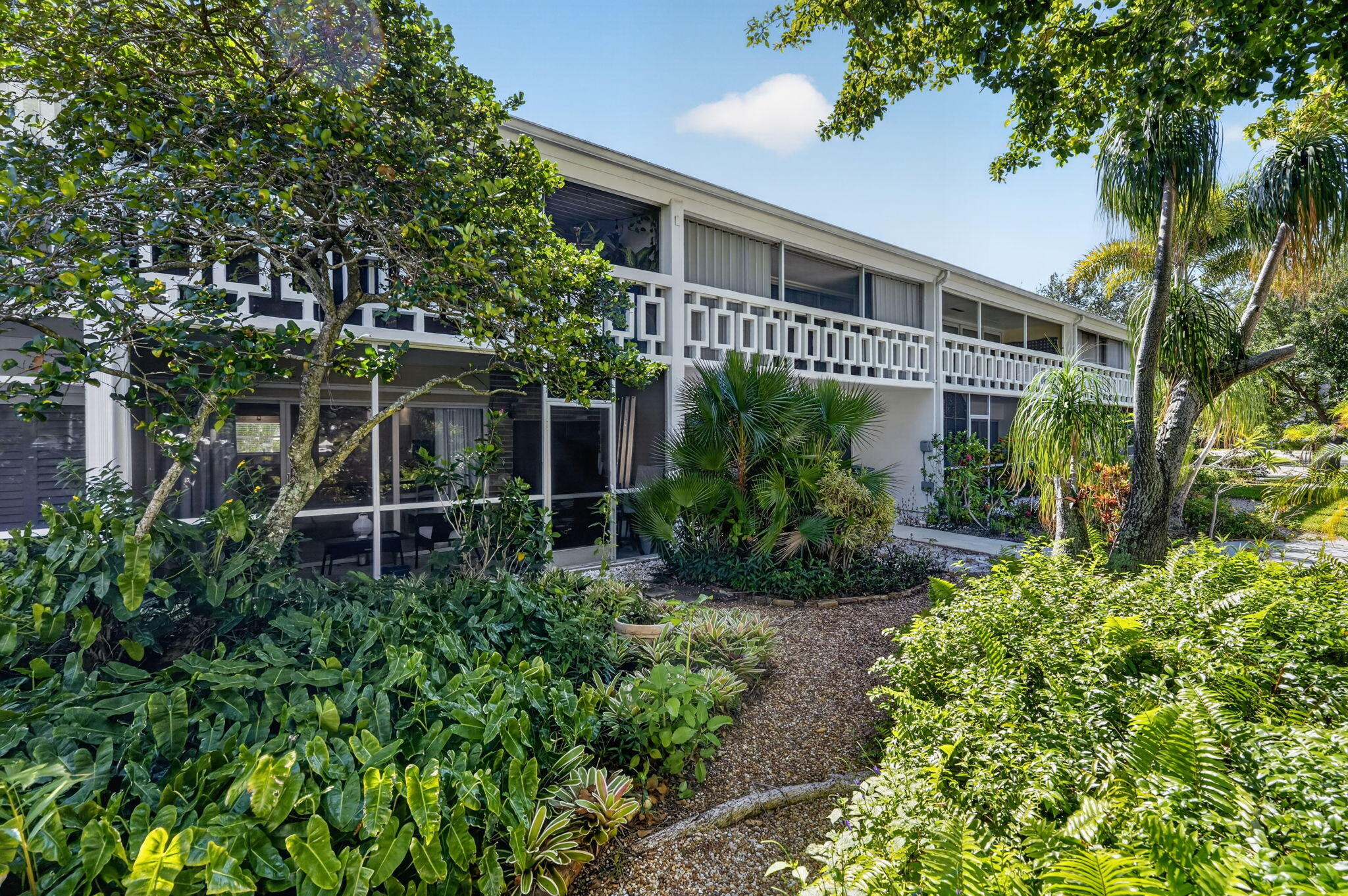 91 Willow Road, Unit 104 Tequesta, FL 33469 - Photo 3 of 25 Screen Porch-Garden View
