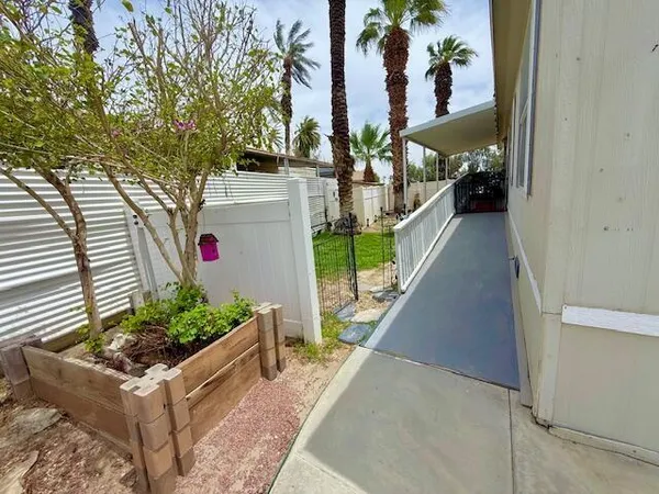 a view of a potted plants in front of a door