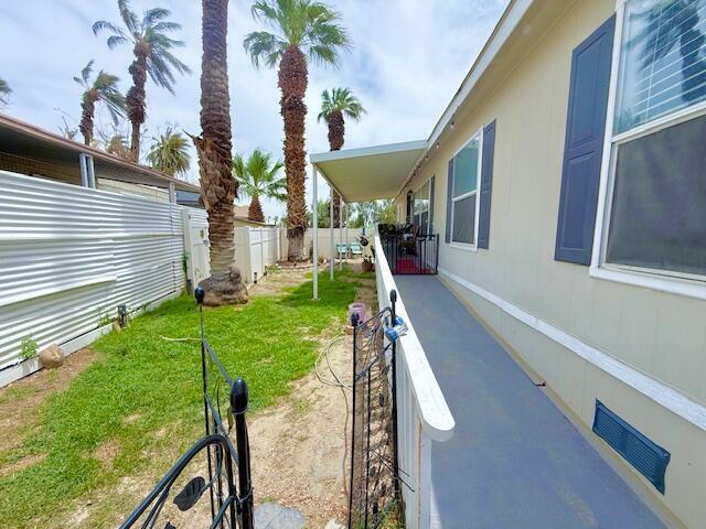 80870 Us Highway Indio, CA 92201 - Photo 4 of 12 a backyard of a house with seating space