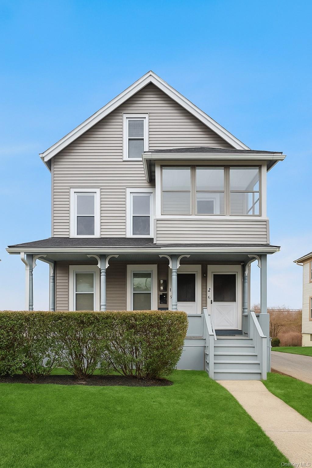 21 Lincoln Avenue, Unit 2 Poughkeepsie, NY 12601 - Photo 1 of 18 a front view of a house with a yard