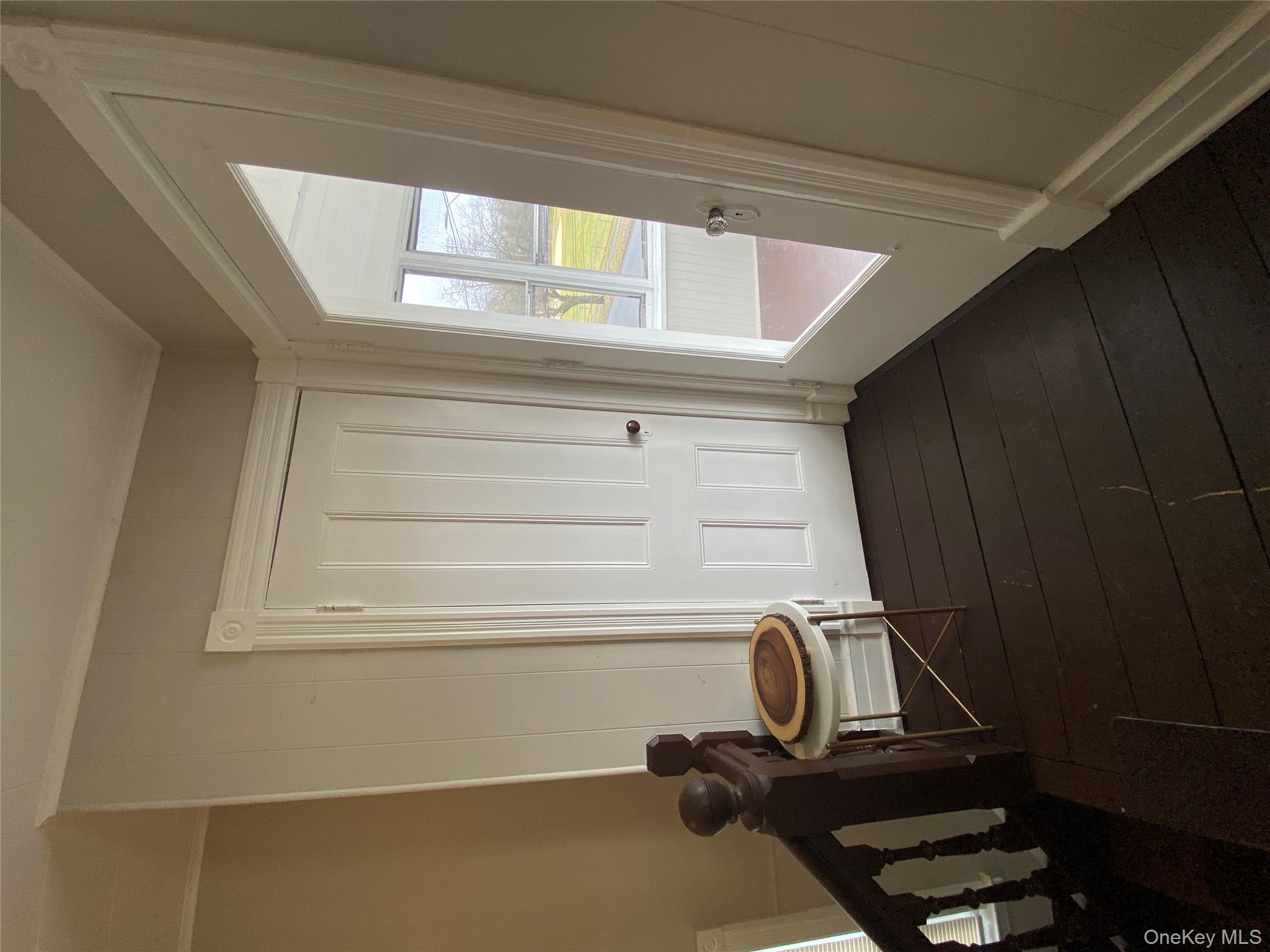 21 Lincoln Avenue, Unit 2 Poughkeepsie, NY 12601 - Photo 13 of 18 a view of a room with furniture and wooden floor