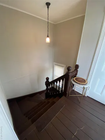 a bench sitting in patio of a house