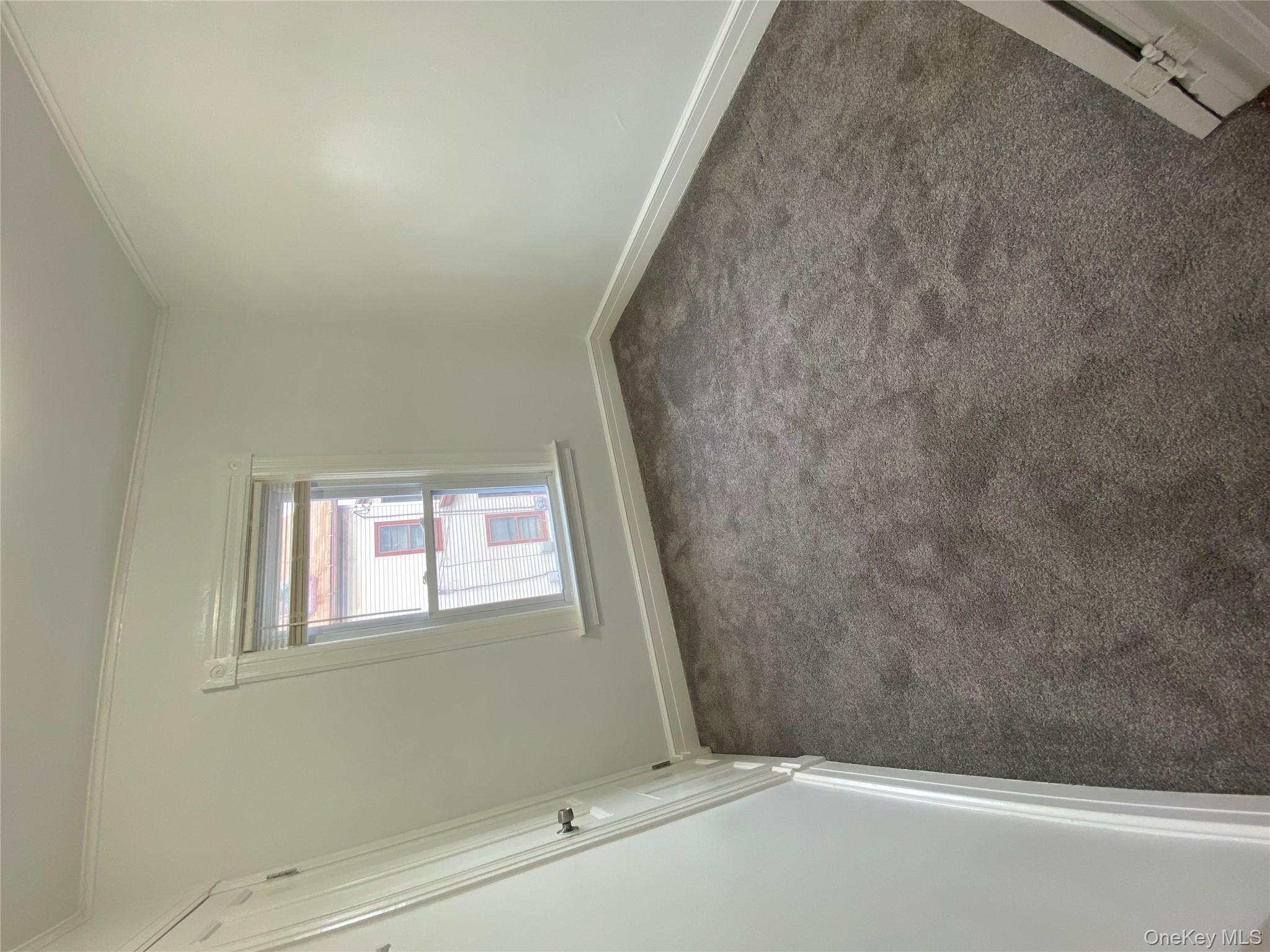 21 Lincoln Avenue, Unit 2 Poughkeepsie, NY 12601 - Photo 10 of 18 an empty room with a window