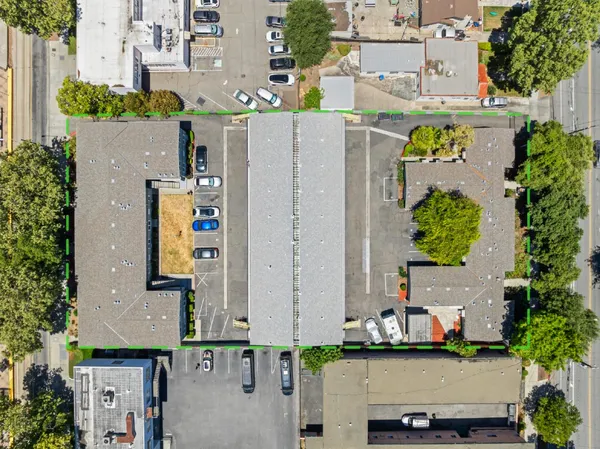 aerial view of a house with lots of trees