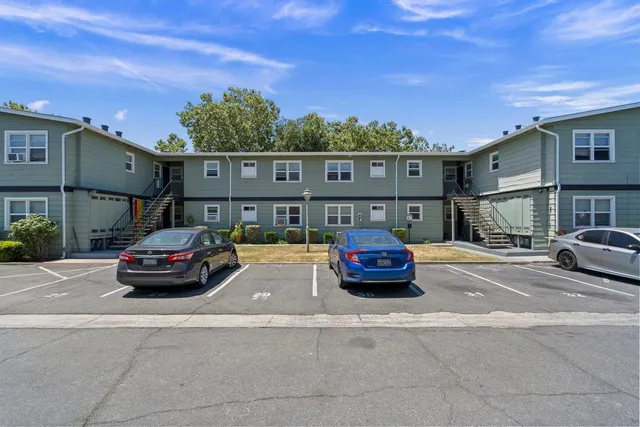 a car parked in front of a house
