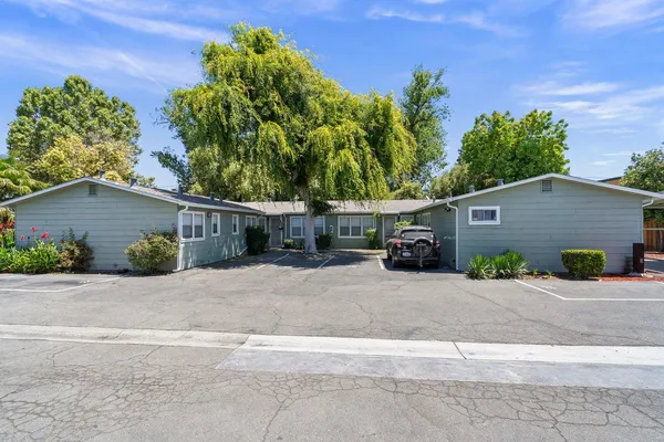 front view of a house with a street
