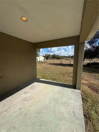 a view of room with a flat screen tv