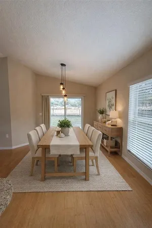 a view of a dining room with furniture