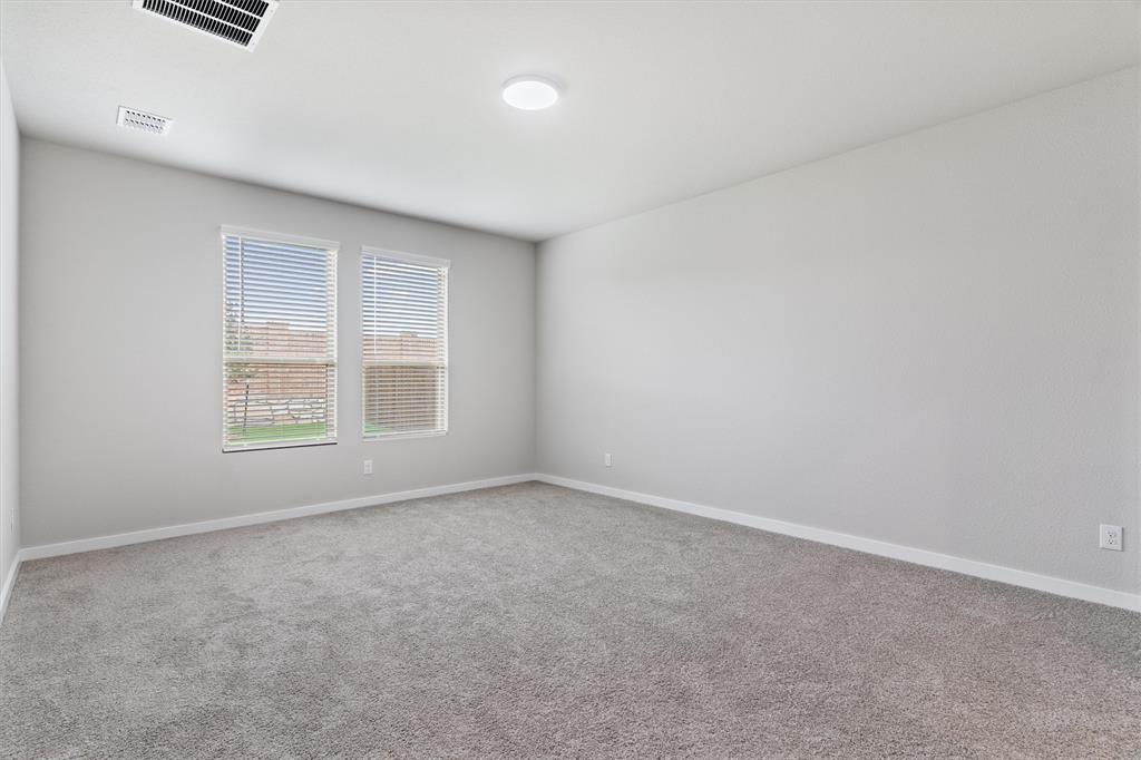 2010 Sandpiper Way Princeton, TX 75407 - Photo 15 of 40 an empty room with windows