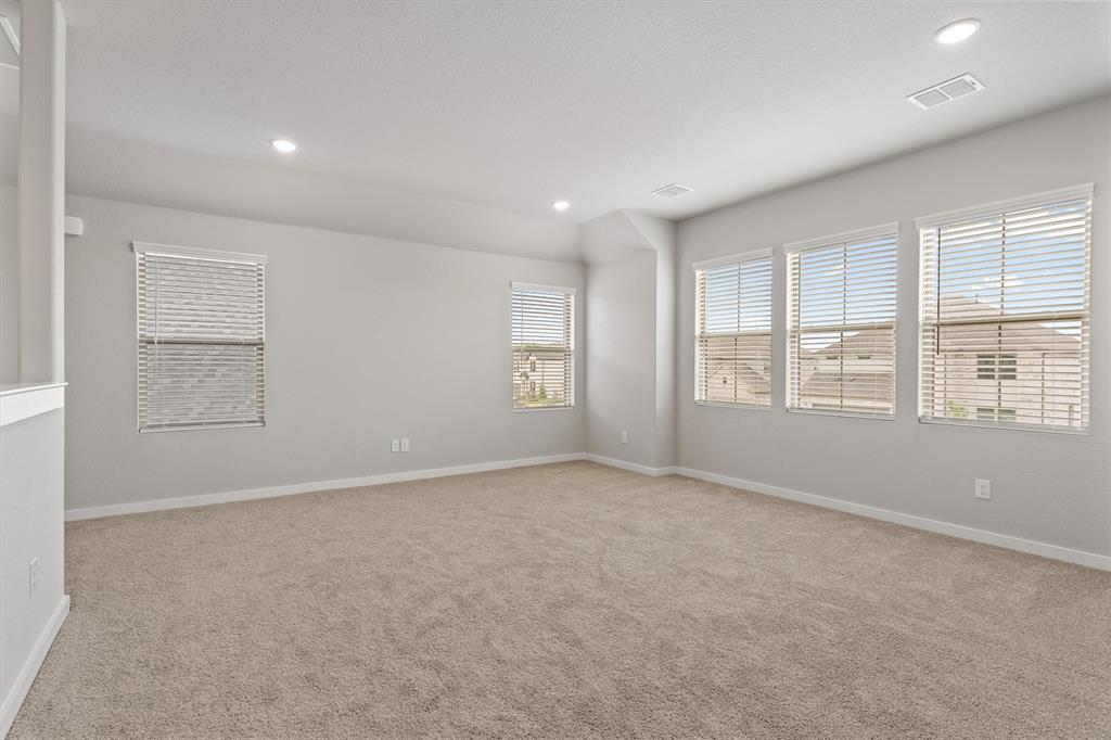 2010 Sandpiper Way Princeton, TX 75407 - Photo 23 of 40 an empty room with windows