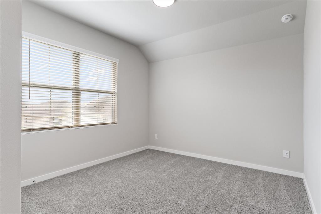 2010 Sandpiper Way Princeton, TX 75407 - Photo 32 of 40 an empty room with a window