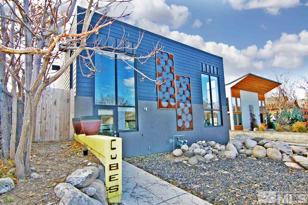 342 Stewart Street Reno, NV 89502 - Photo 1 of 11 a front view of a house with parking