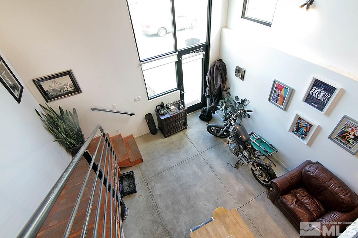 342 Stewart Street Reno, NV 89502 - Photo 3 of 11 a living room with furniture and a large window
