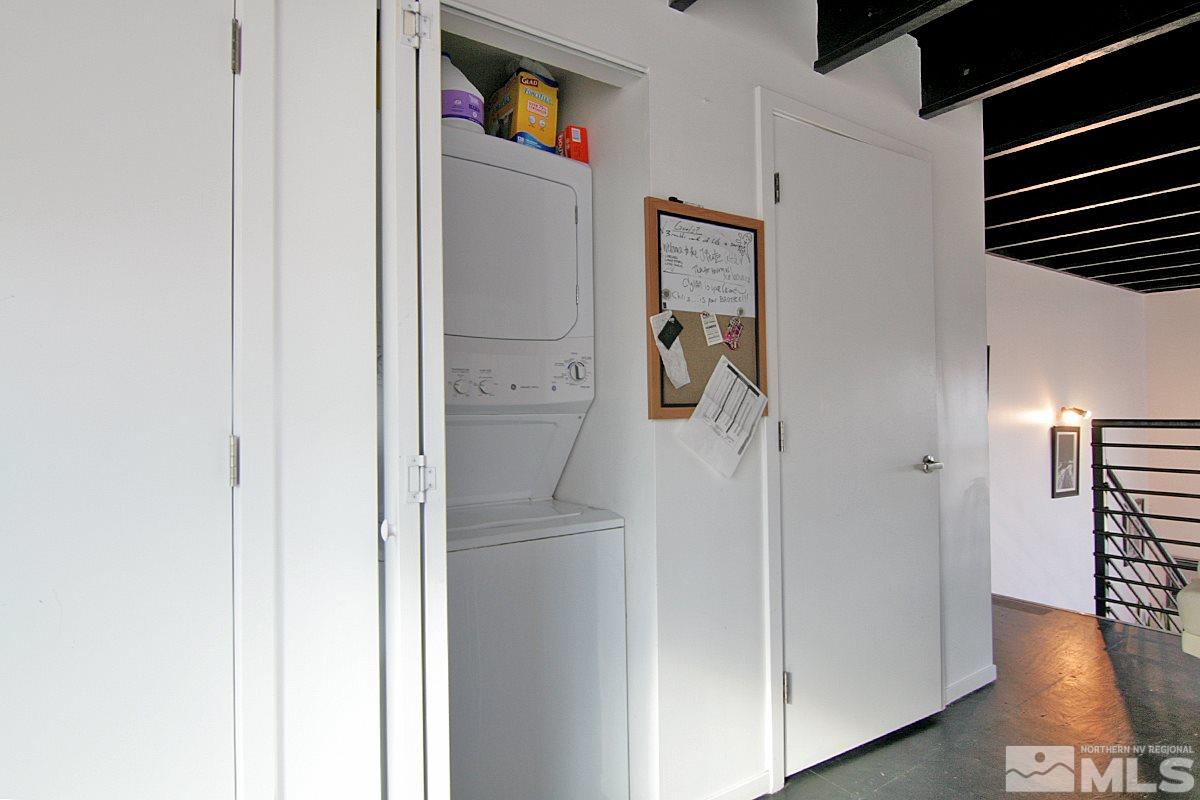 342 Stewart Street Reno, NV 89502 - Photo 5 of 11 a view of a hallway with wooden floor and closet
