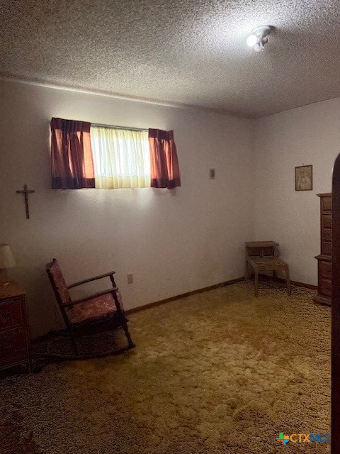 215 Price Street Yoakum, TX 77995 - Photo 14 of 20 a room with furniture and window