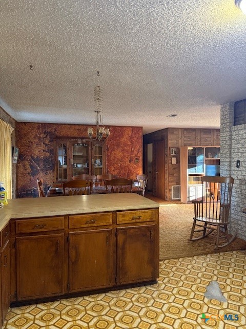 215 Price Street Yoakum, TX 77995 - Photo 8 of 20 a kitchen with stainless steel appliances granite countertop a sink and cabinets